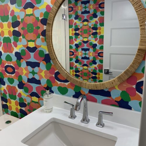 clean sink and mirror in color bathroom